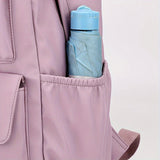 Casual backpack with a teddy bear keychain and a bottle pocket, unisex version