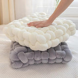 Weighted sensory cushion, a cushion providing deep pressure
